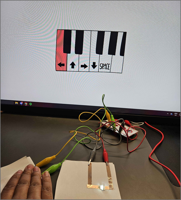 showcasing the switch that is pressing down a piano key