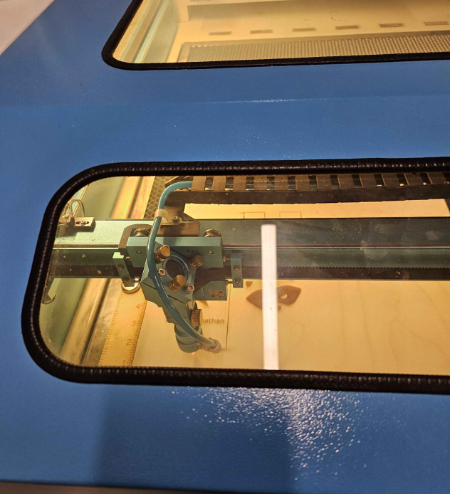 the process of the machine stenciling in the design